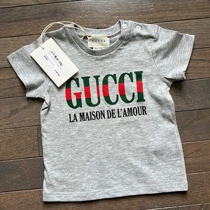 Gucci baby tee. Two button shoulder. NWT